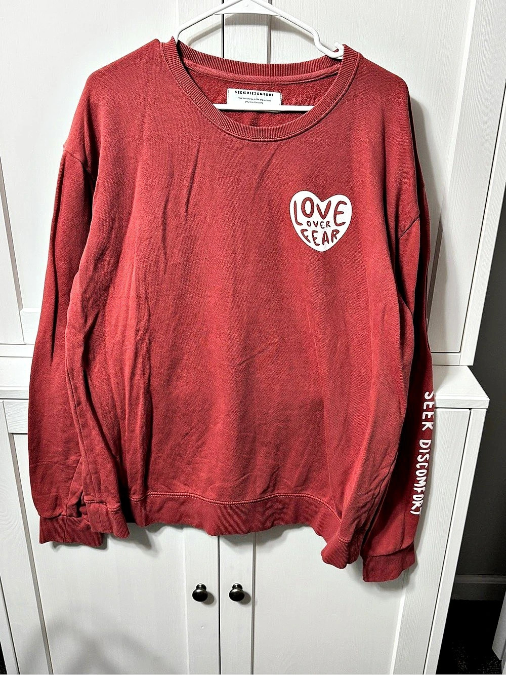 Seek Discomfort Graphic Sweatshirt in coral XL Like New